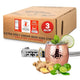 A cardboard box labeled Top Hat Extra Spicy Ginger Beer Bag in Box Soda Syrup BIB - 3 gallon B2B” from Top Hat Provisions is nearby. In front, a copper mug with ice, lime slices, and mint is ready for crafting Moscow Mules. Fresh ginger, limes, coiled metal tubing, and a tap attachment complete the scene.