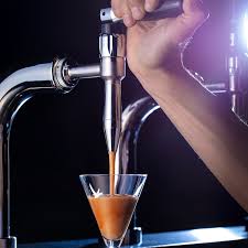 "Espresso-tini on tap pouring image